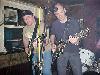 A pair of black Les Pauls