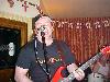 Kenny also sings