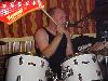 Spence manages to avoid bleeding on the drum kit